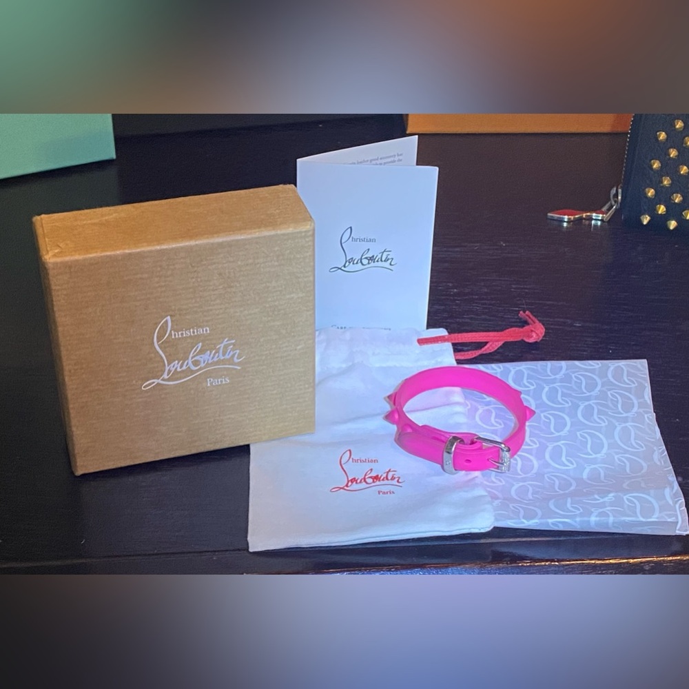 Auth Christian Louboutin pink bracelet with silver hardware full inclusion